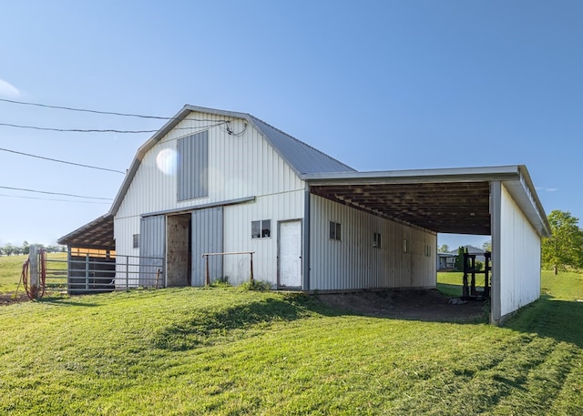 view of outdoor structure with a lawn