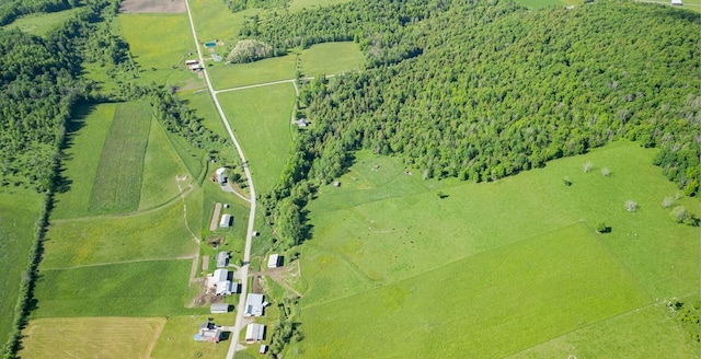 birds eye view of property featuring a rural view