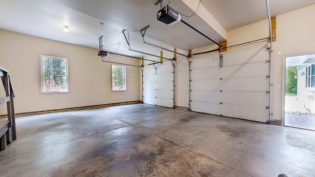 garage featuring a garage door opener