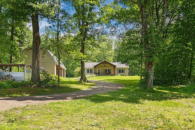 view of front of home featuring a front lawn