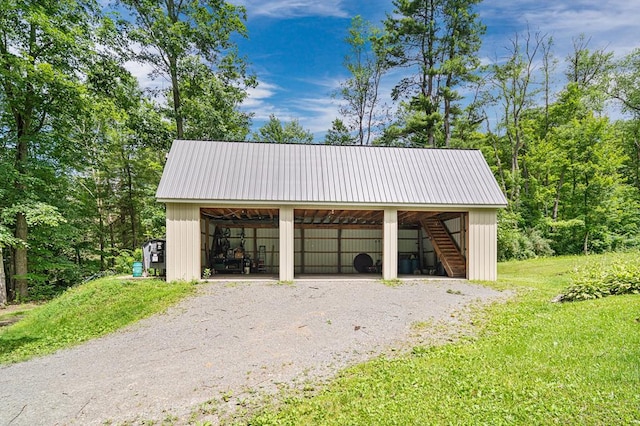 exterior space with a lawn and an outdoor structure