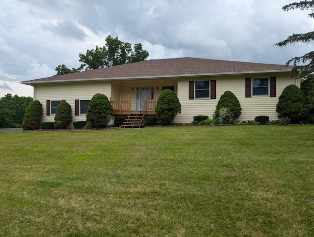 single story home featuring a front yard