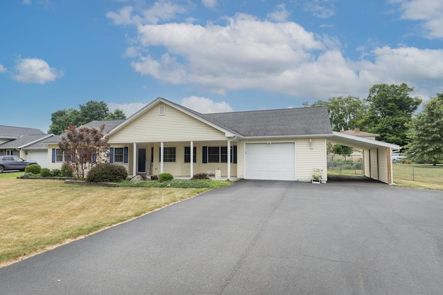 ranch-style house featuring a front yard, a porch, and a carport