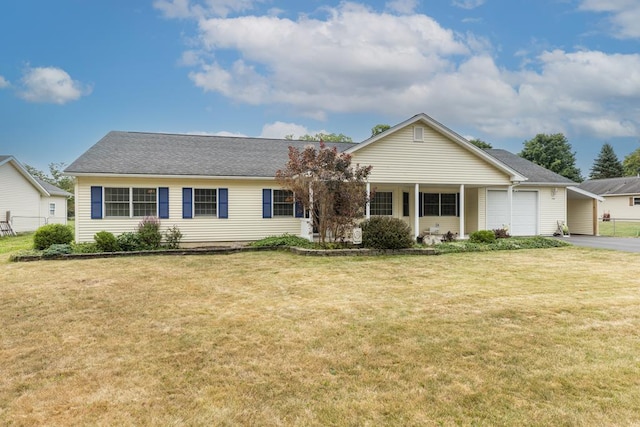 single story home featuring a front yard and a garage