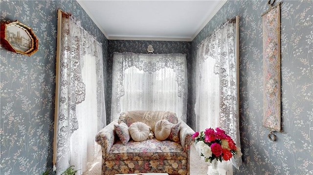 sitting room featuring ornamental molding