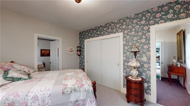 carpeted bedroom with a closet