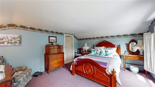 carpeted bedroom with vaulted ceiling