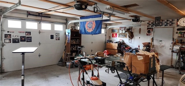 garage featuring a garage door opener