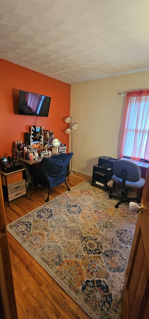 interior space with hardwood / wood-style floors