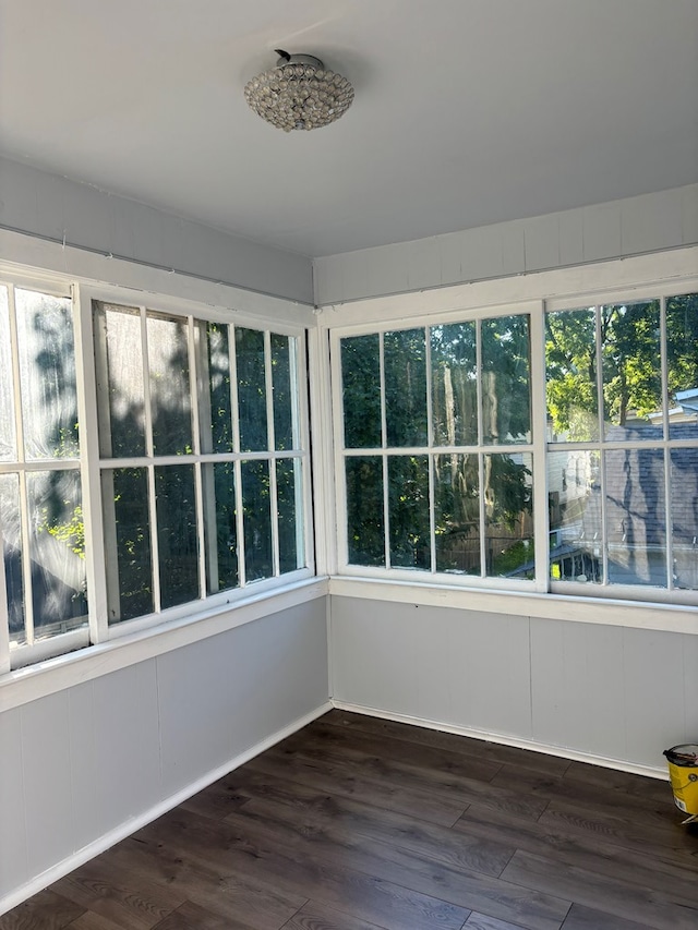 unfurnished sunroom featuring plenty of natural light