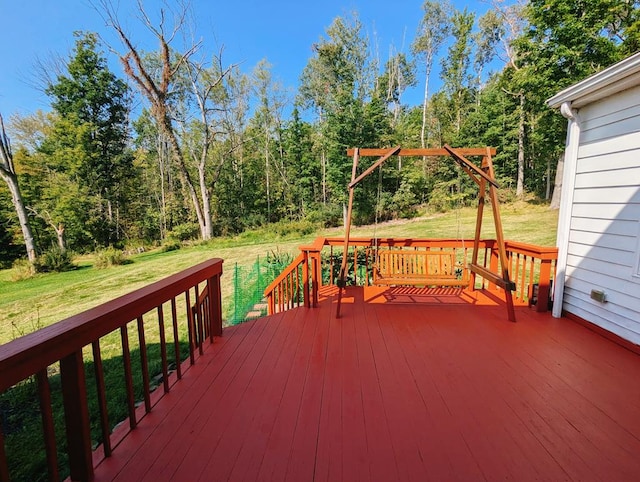 deck featuring a yard