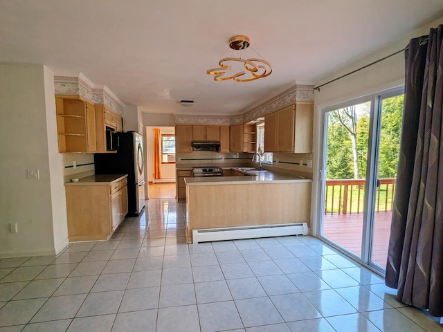 kitchen featuring extractor fan, a baseboard radiator, sink, hanging light fixtures, and light tile patterned floors