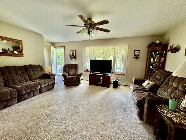 carpeted living room featuring a textured ceiling, ceiling fan, and a baseboard heating unit