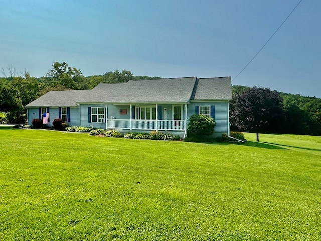 single story home with a porch and a front yard