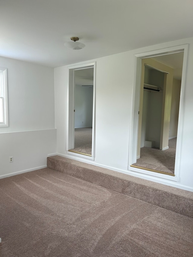 spare room with carpet