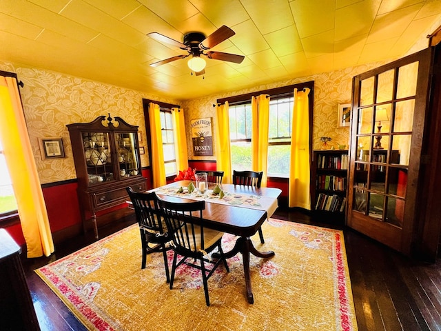 dining room featuring dark wood-type flooring and ceiling fan