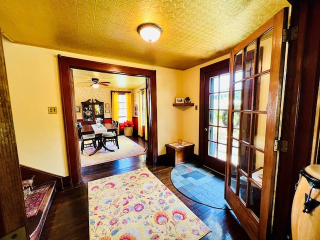 doorway to outside with dark wood-type flooring