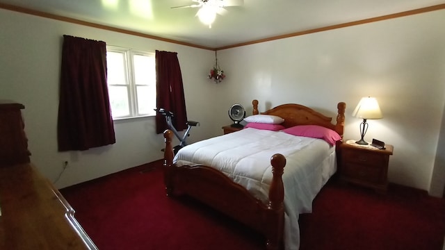 carpeted bedroom featuring crown molding and ceiling fan