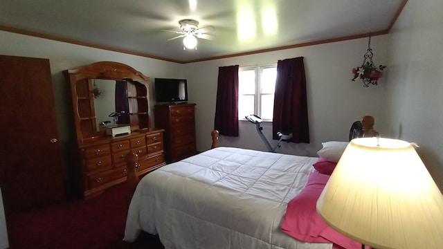 bedroom with ceiling fan and ornamental molding