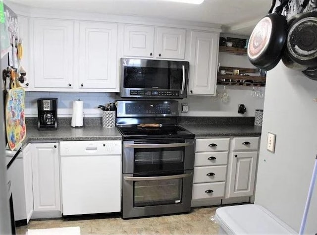 kitchen featuring white cabinetry and appliances with stainless steel finishes