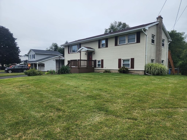 raised ranch featuring a front lawn