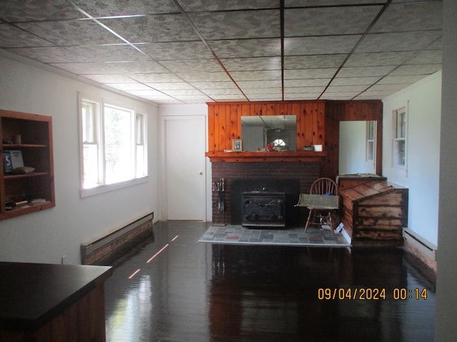 living room with a wood stove