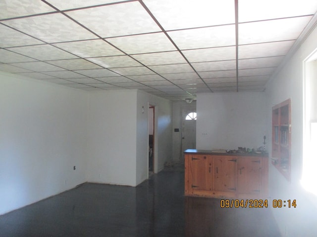 bar featuring a paneled ceiling