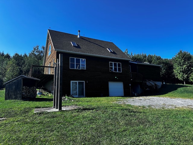 view of property exterior with a lawn and a garage