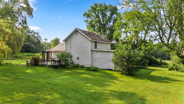 view of property exterior with a lawn