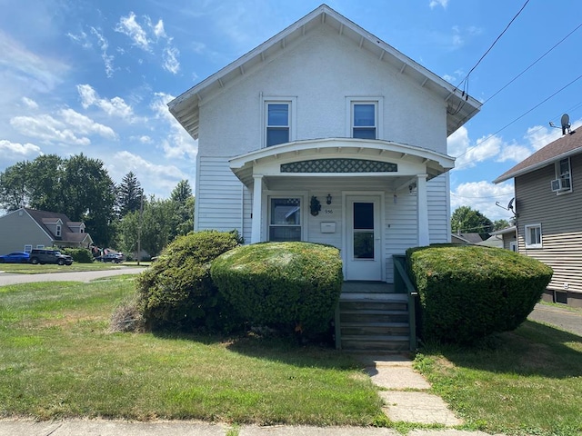 view of front of property featuring a front yard