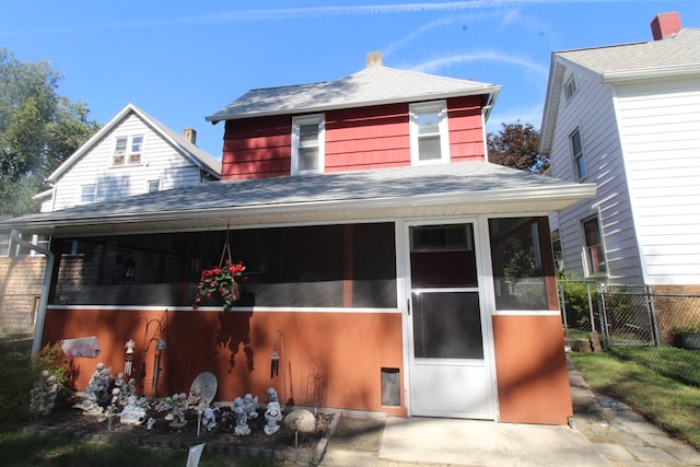 view of front facade featuring a sunroom