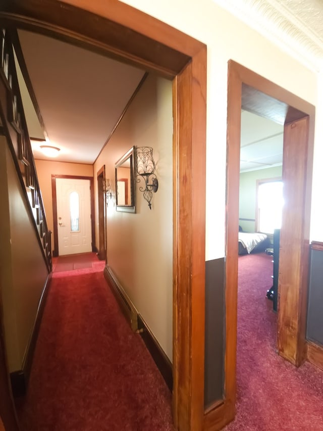 corridor with dark carpet