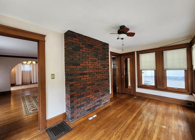 unfurnished room featuring hardwood / wood-style flooring and ceiling fan