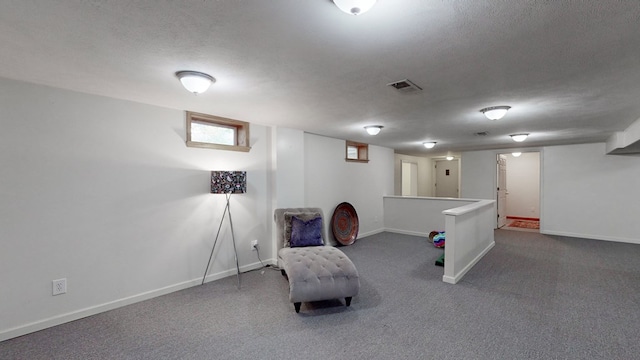 interior space featuring a textured ceiling