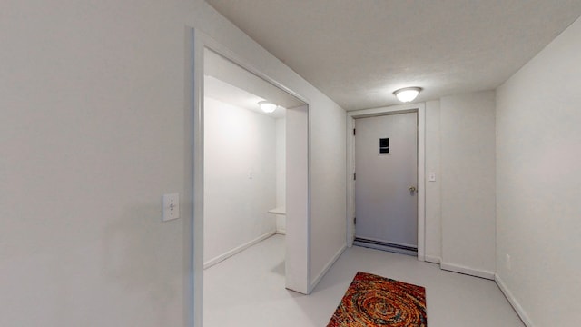 entryway featuring a textured ceiling