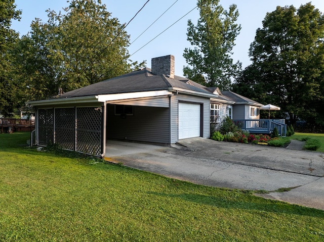 exterior space featuring a yard and a carport