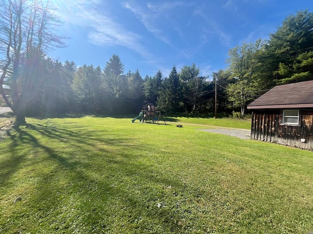 view of yard with a playground