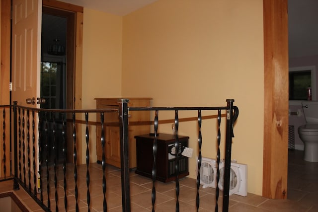 corridor featuring tile patterned flooring