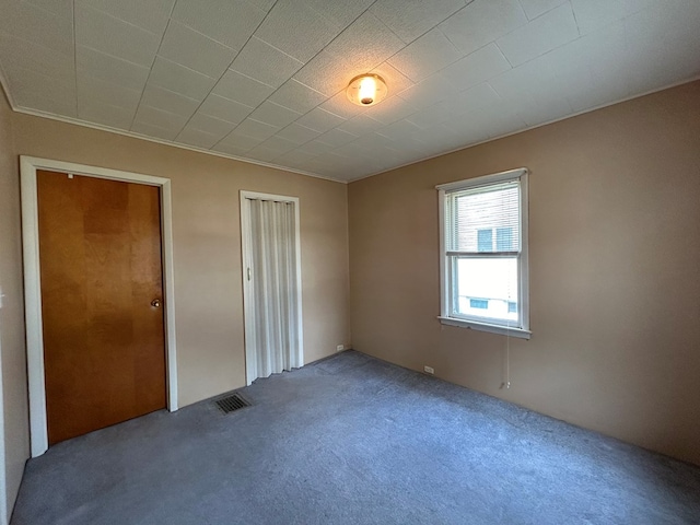 unfurnished bedroom with carpet