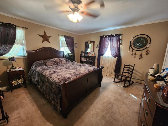 bedroom with light carpet, ornamental molding, multiple windows, and ceiling fan