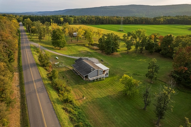 birds eye view of property featuring a rural view