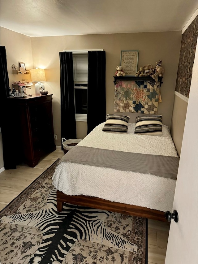 bedroom with light hardwood / wood-style flooring