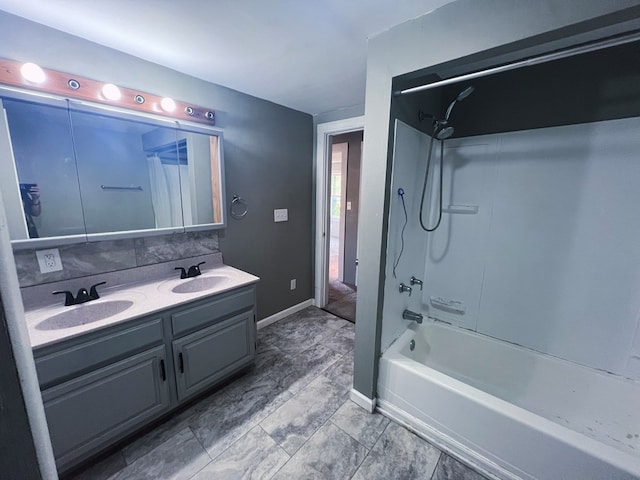 bathroom with backsplash, vanity, and shower / tub combo with curtain