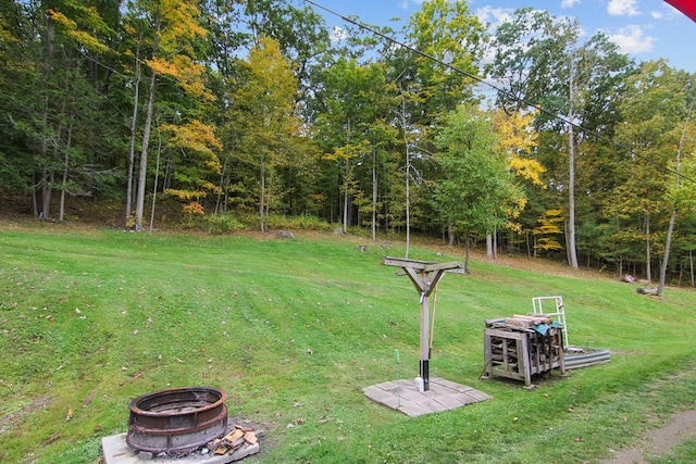 view of yard featuring a fire pit