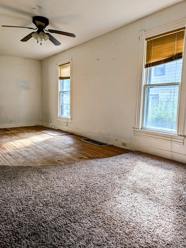 empty room featuring ceiling fan