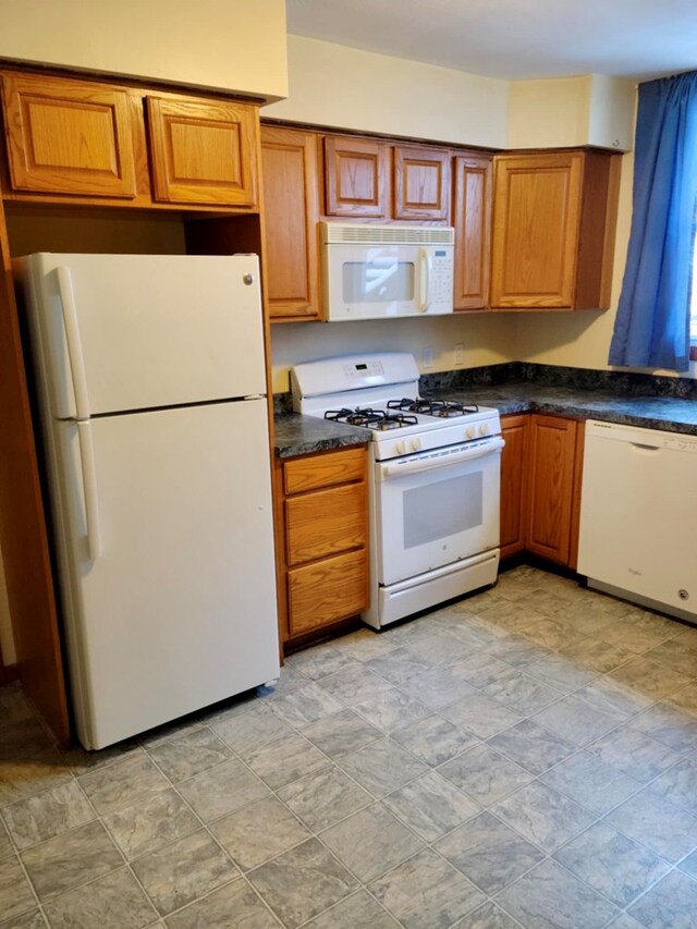 kitchen featuring white appliances