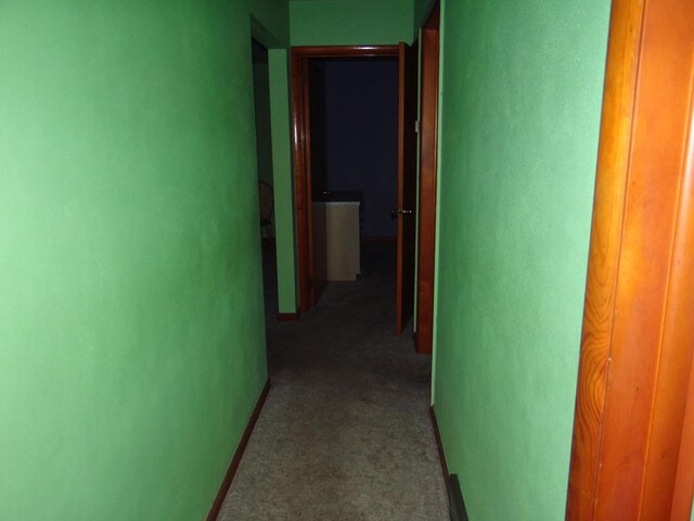 hallway with carpet