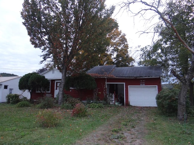 ranch-style home with a garage