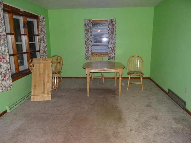 living area featuring carpet