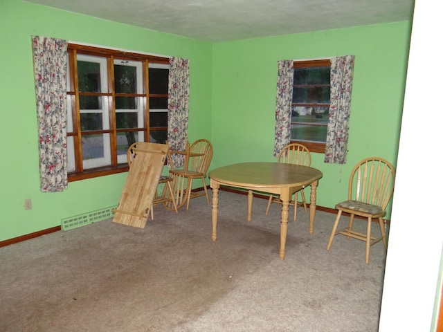 view of carpeted dining area